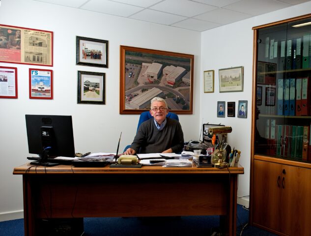 Masons Removals Cardiff Director, Gordon, at his desk
