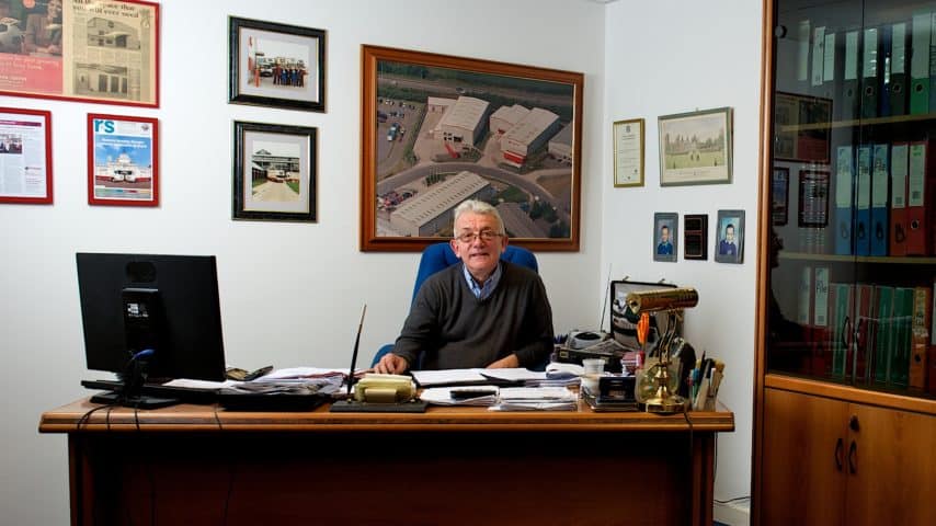 Masons Removals Cardiff Director, Gordon, at his desk