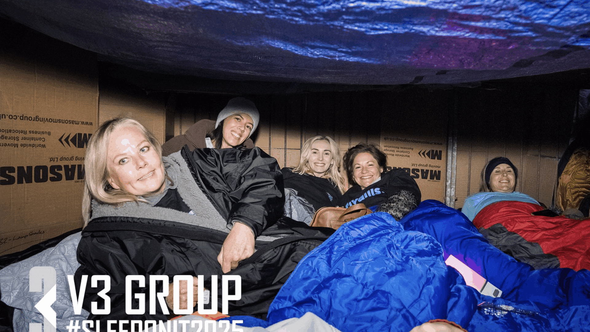 group of friends helping llamau charity